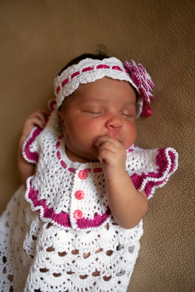 Sweet Silver Spring Doula African American Baby girl in crocheted outfit
