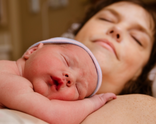 Silver Spring Doula baby resting on mom after birth